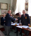 Andy Mullen receiving the Colin Reid Golf Trophy from Frank Murray 18 November 2012
