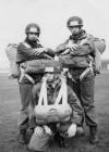 Spr. Albert Leslie, standing right, and two others from 300 Sqn. kitted up for a clean fatigue descent on their basic Para. Course at RAF Abingdon early 60s.
