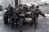 Gordon McLeod and Andy Paterson and others manhandling a Heavy Ferry Trailer at Drip Camp circa 1964