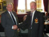 Jim Simpson receiving his Presidents Commendation Brooch from AEA Scotland  Chaiman Frank Murray  on 20 November 2011