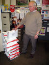 Postmaster with shoeboxes complete and ready to be sent.
